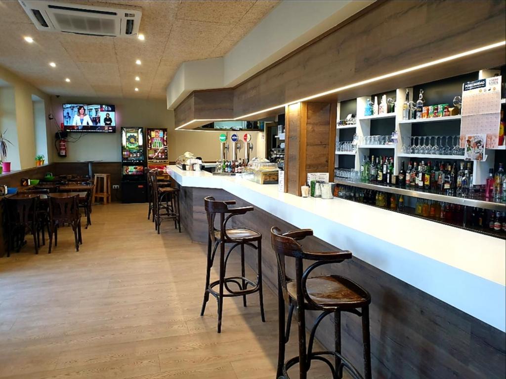 Lounge nebo bar v ubytování Hotel El Peregrino