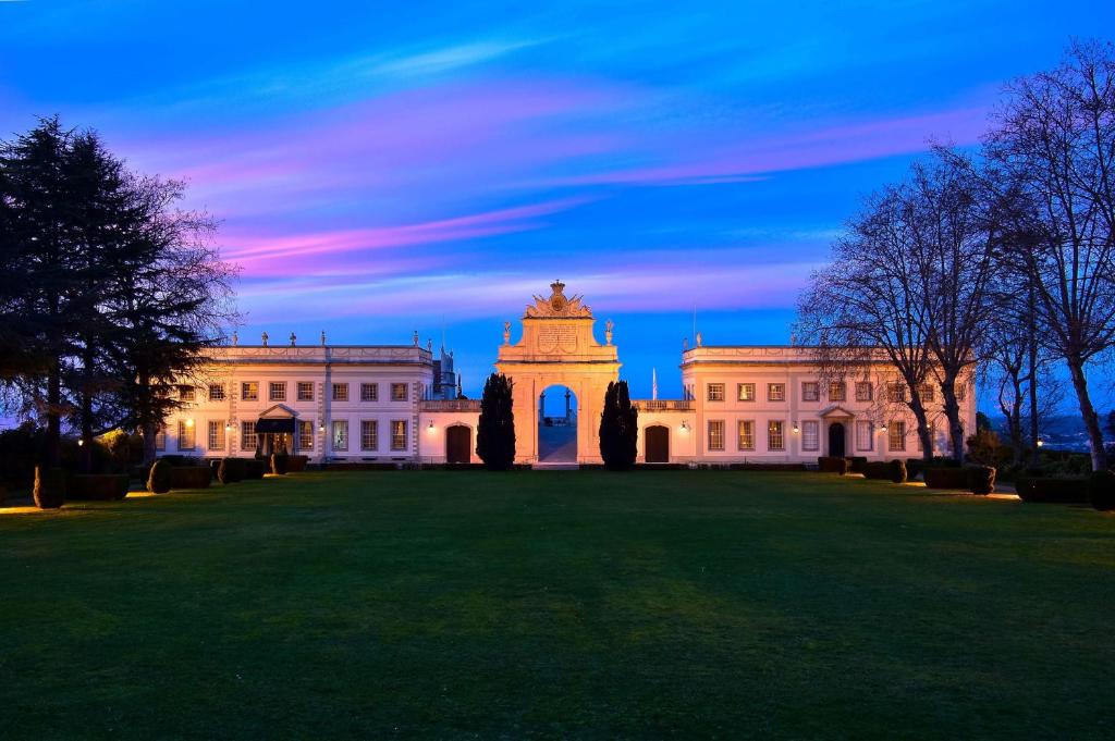 a large building with a large lawn in front of it at Valverde Sintra Palácio de Seteais in Sintra