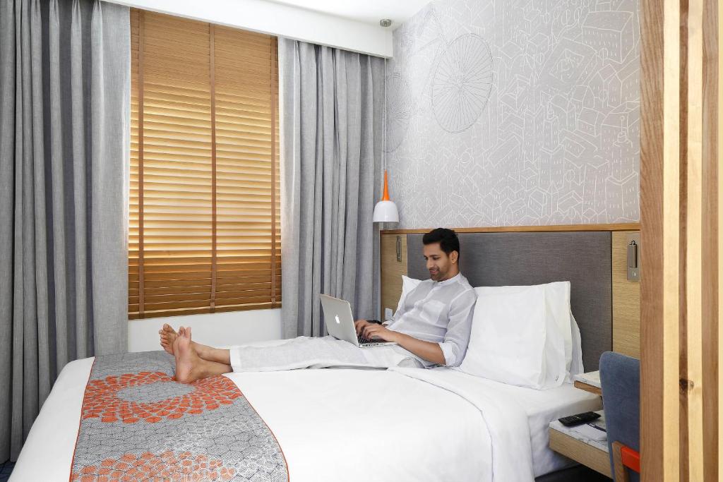 Postel nebo postele na pokoji v ubytování Holiday Inn Express Chennai OMR Thoraipakkam by IHG