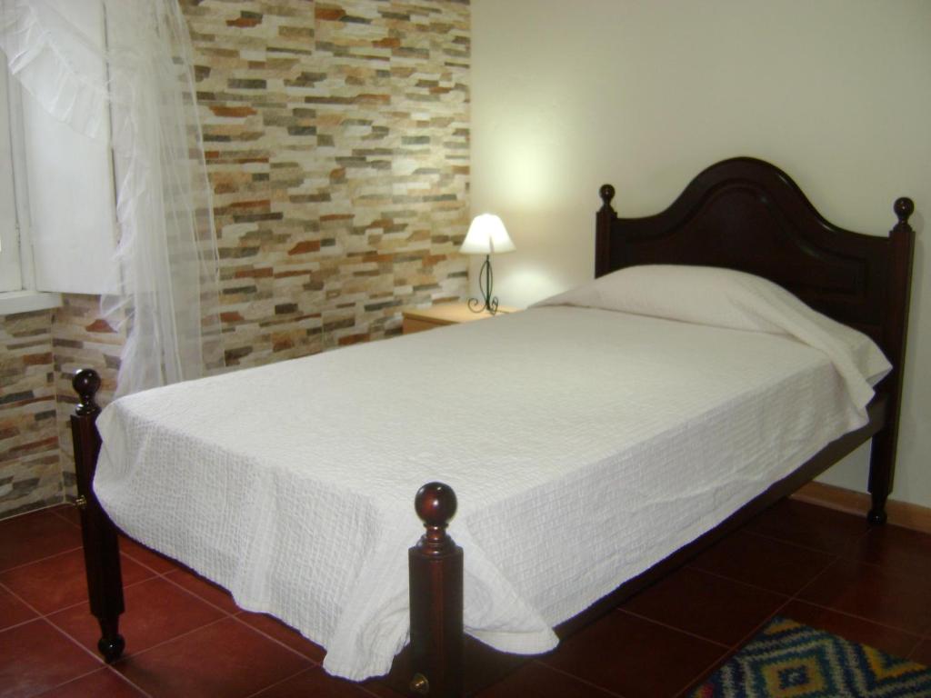 Кровать или кровати в номере Casa d'Amália