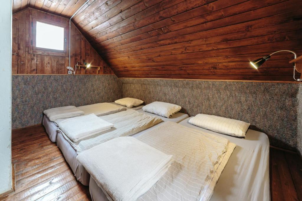 Postel nebo postele na pokoji v ubytování Chalet Tisa Velika Planina