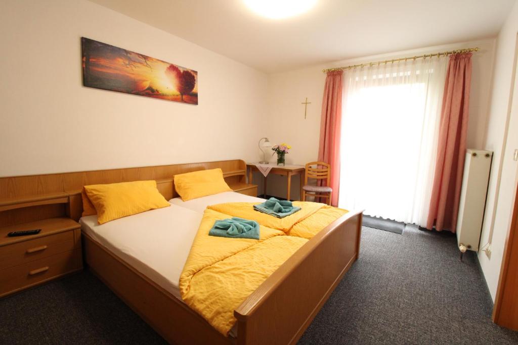 Postel nebo postele na pokoji v ubytování Zur Auszeit