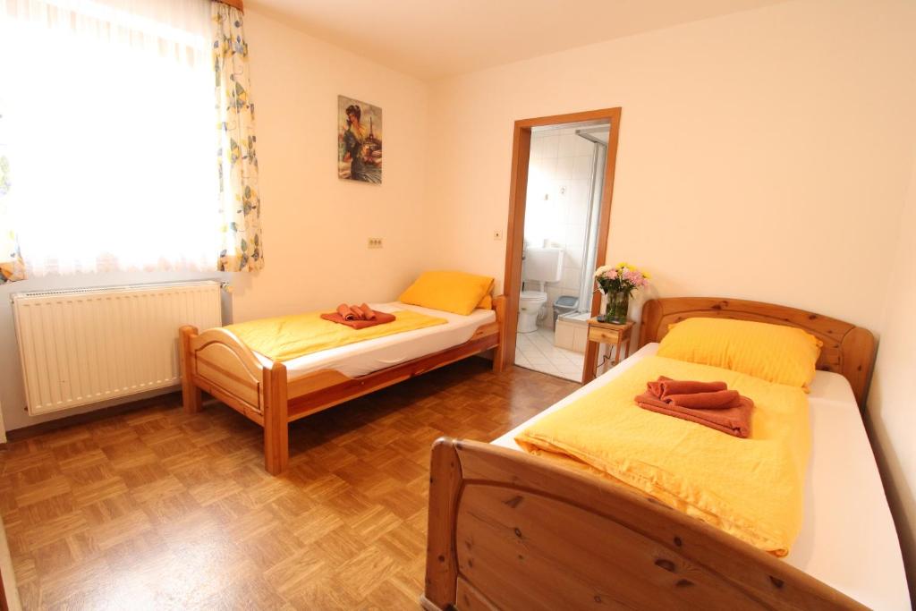 Postel nebo postele na pokoji v ubytování Zur Auszeit