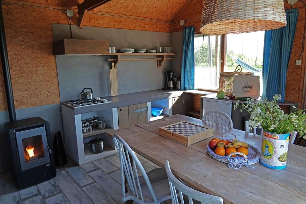 Kuchyň nebo kuchyňský kout v ubytování B&B Welgelegen