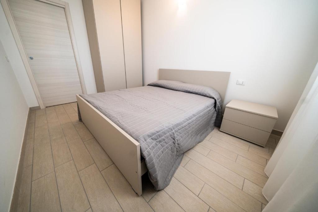 Postel nebo postele na pokoji v ubytování Sabbia & Mare
