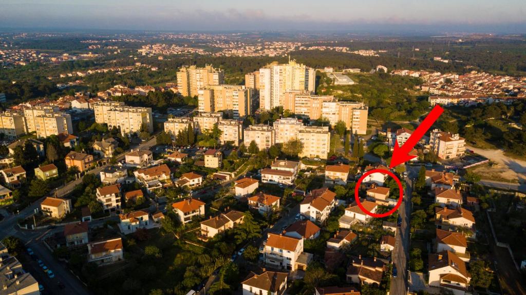a view of a city with a red circle in the foreground at Morena in Pula