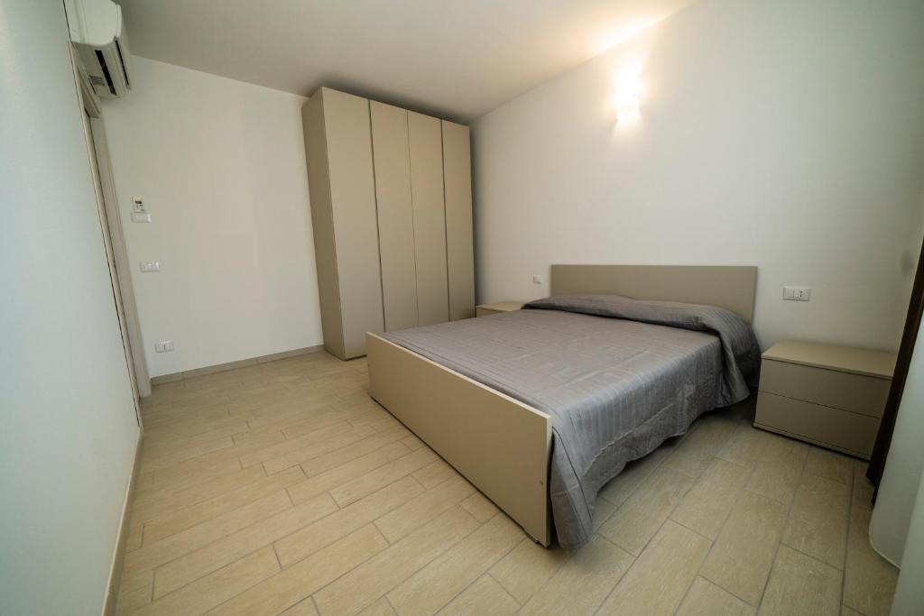 Postel nebo postele na pokoji v ubytování Sabbia & Mare