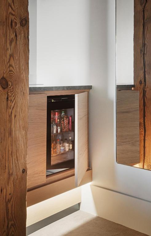 a kitchen with an oven with drinks in it at Copenhagen Admiral Hotel in Copenhagen