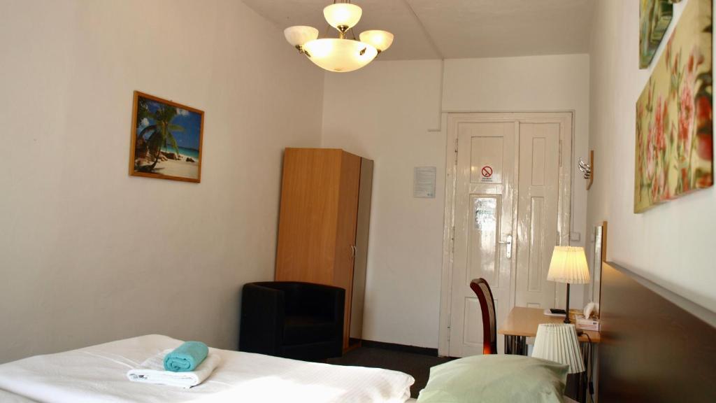 Postel nebo postele na pokoji v ubytování Pension Village