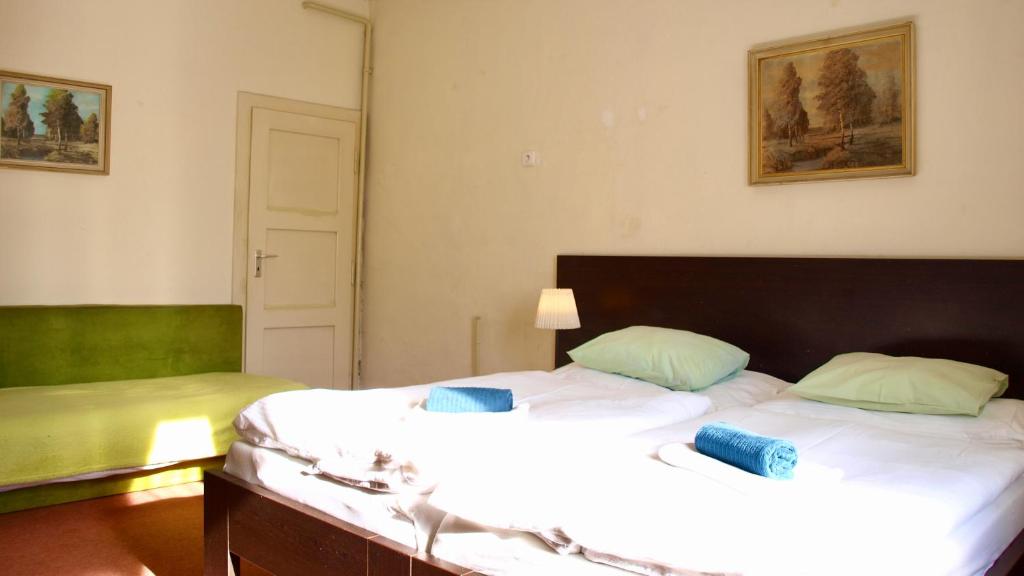 Postel nebo postele na pokoji v ubytování Pension Village