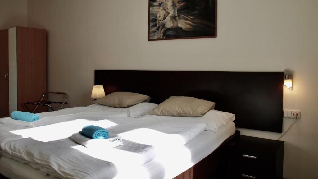 Postel nebo postele na pokoji v ubytování Pension Village