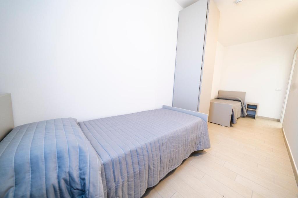 Postel nebo postele na pokoji v ubytování Sabbia & Mare