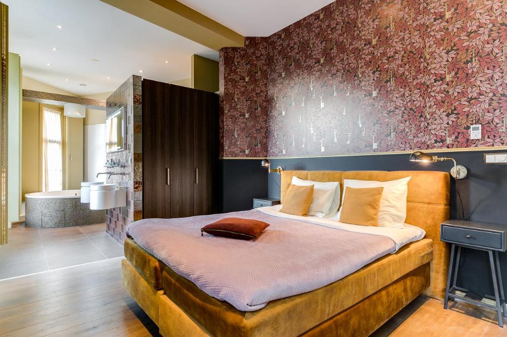 Letto o letti in una camera di Brasss Hotel Suites