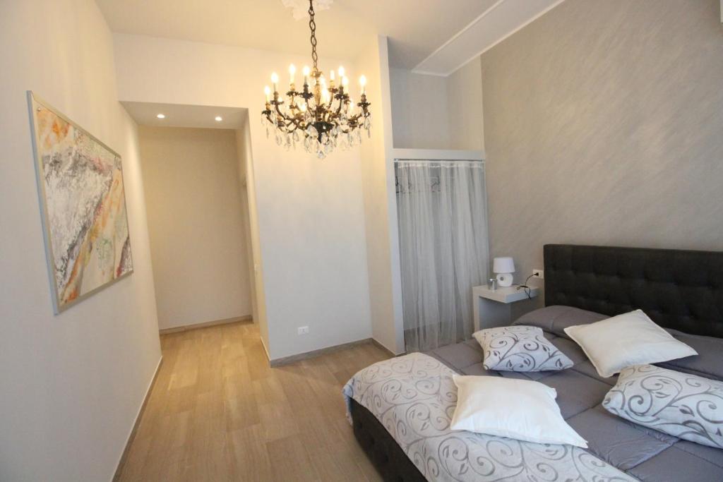 Postel nebo postele na pokoji v ubytování Ad Astra Rooms