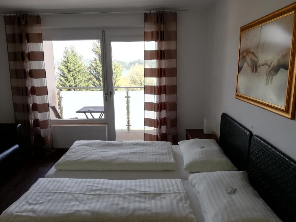 Voodi või voodid majutusasutuse Hotel Faaker See Inn by S4Y toas