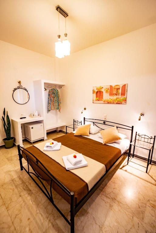 Postel nebo postele na pokoji v ubytování Join Us Low Cost Rooms