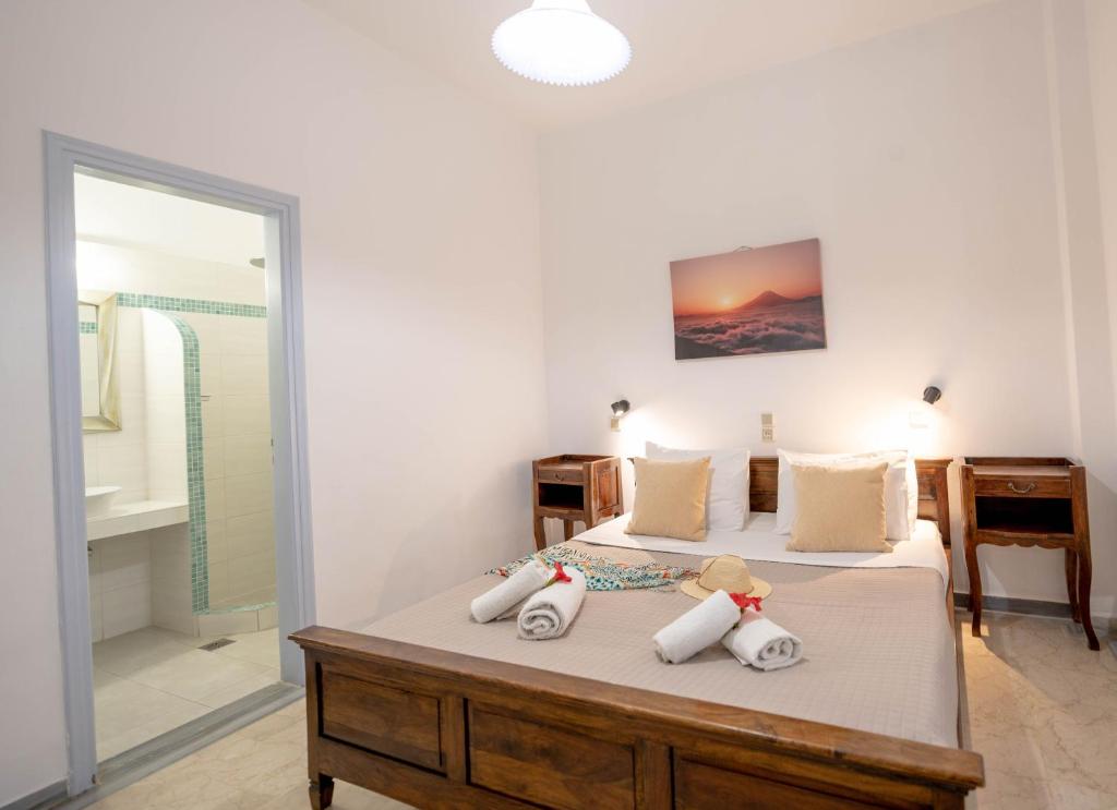 Postel nebo postele na pokoji v ubytování Join Us Low Cost Rooms