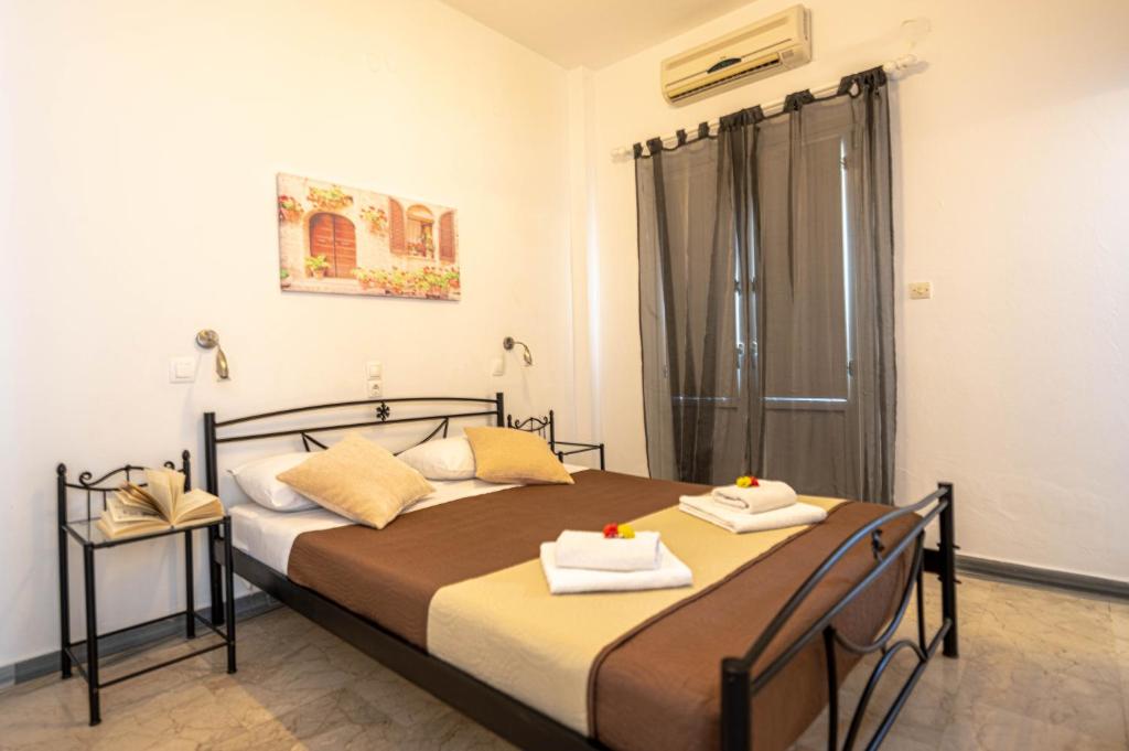 Postel nebo postele na pokoji v ubytování Join Us Low Cost Rooms