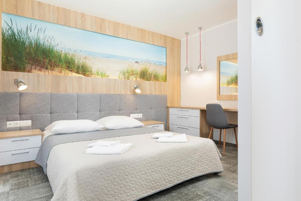 Postel nebo postele na pokoji v ubytování Dom wakacyjny Cyprys