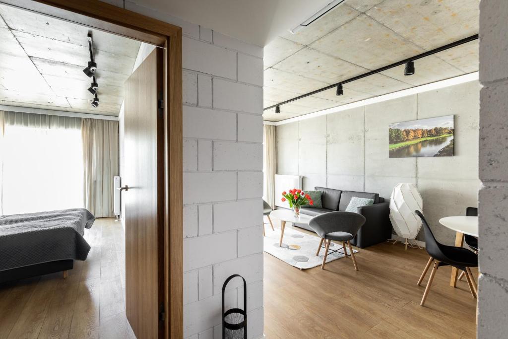 Posteľ alebo postele v izbe v ubytovaní River Side Residence nr3