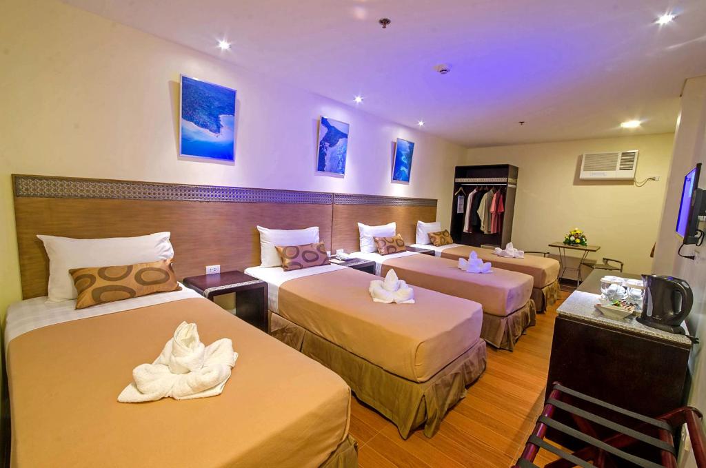 Fersal Hotel - Puerto Princesa - Deluxe Quadruple Room