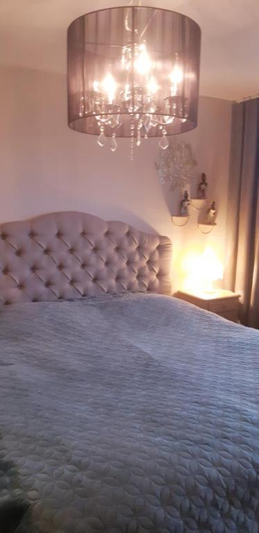 Postel nebo postele na pokoji v ubytování Apartment Nathalie