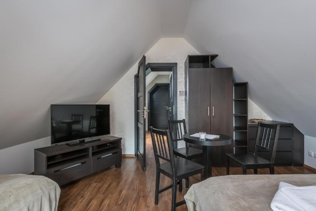 TV a/nebo společenská místnost v ubytování Apartmány 294