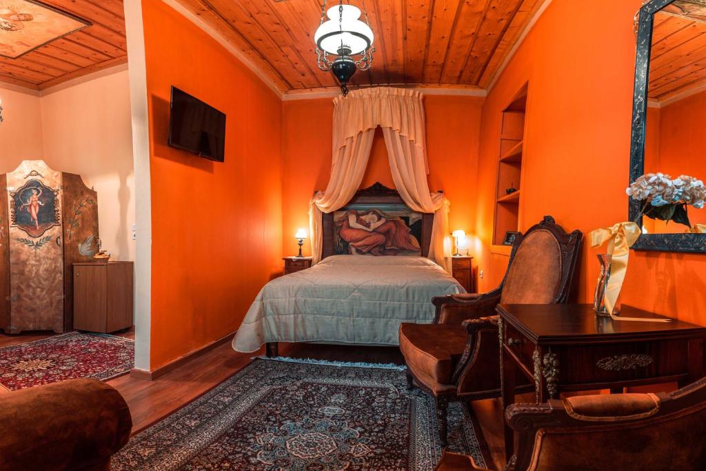 Кровать или кровати в номере Ilion Hotel
