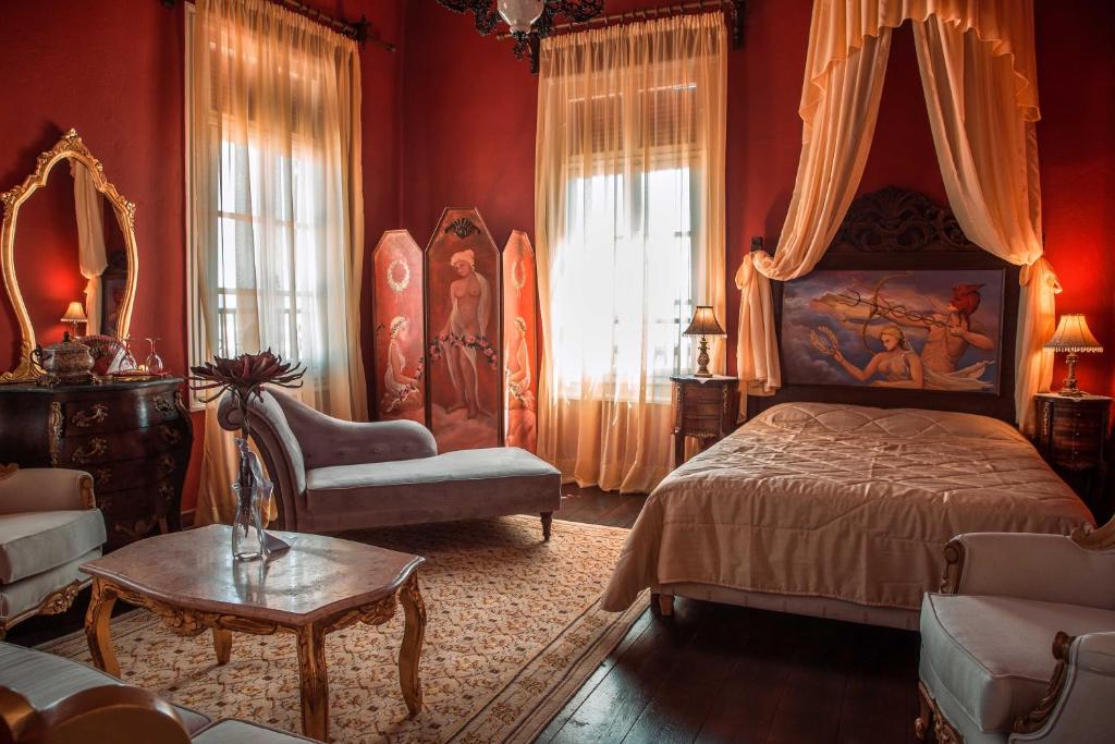 Кровать или кровати в номере Ilion Hotel