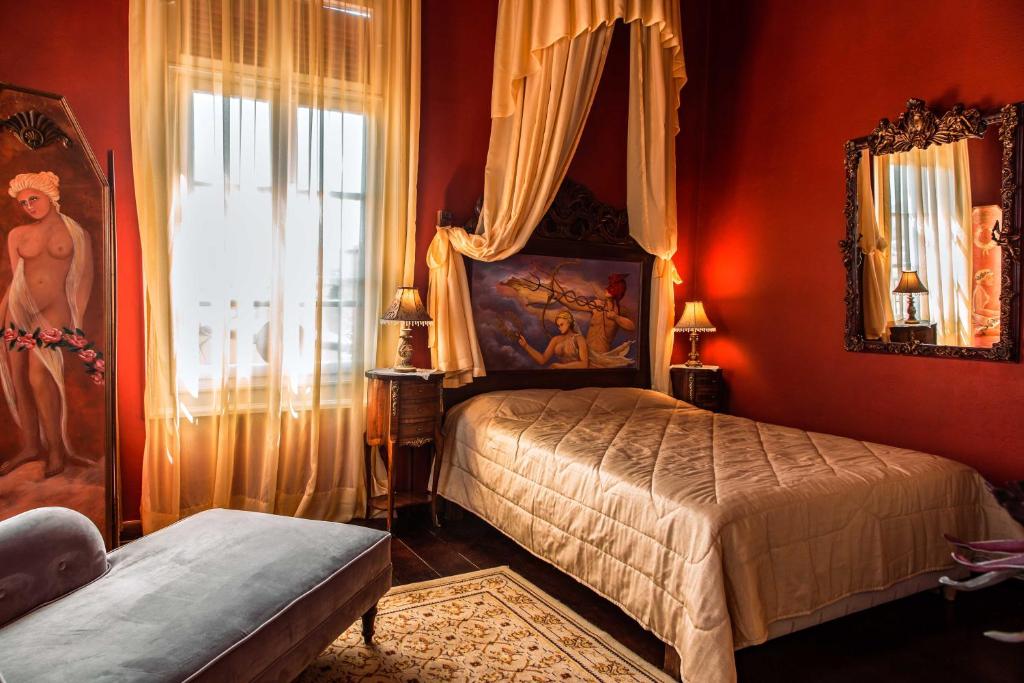 Кровать или кровати в номере Ilion Hotel