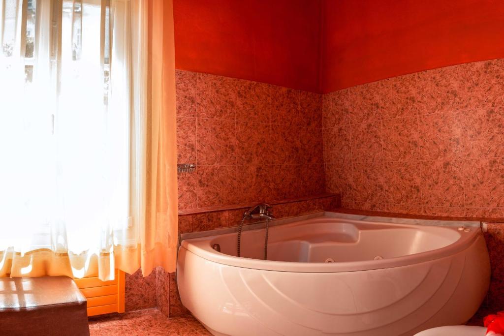Ванная комната в Ilion Hotel