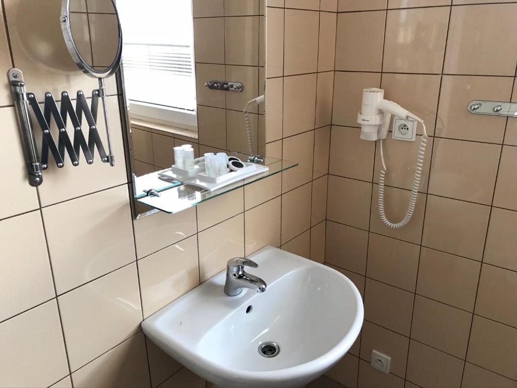 Koupelna v ubytování Hotel Aréna