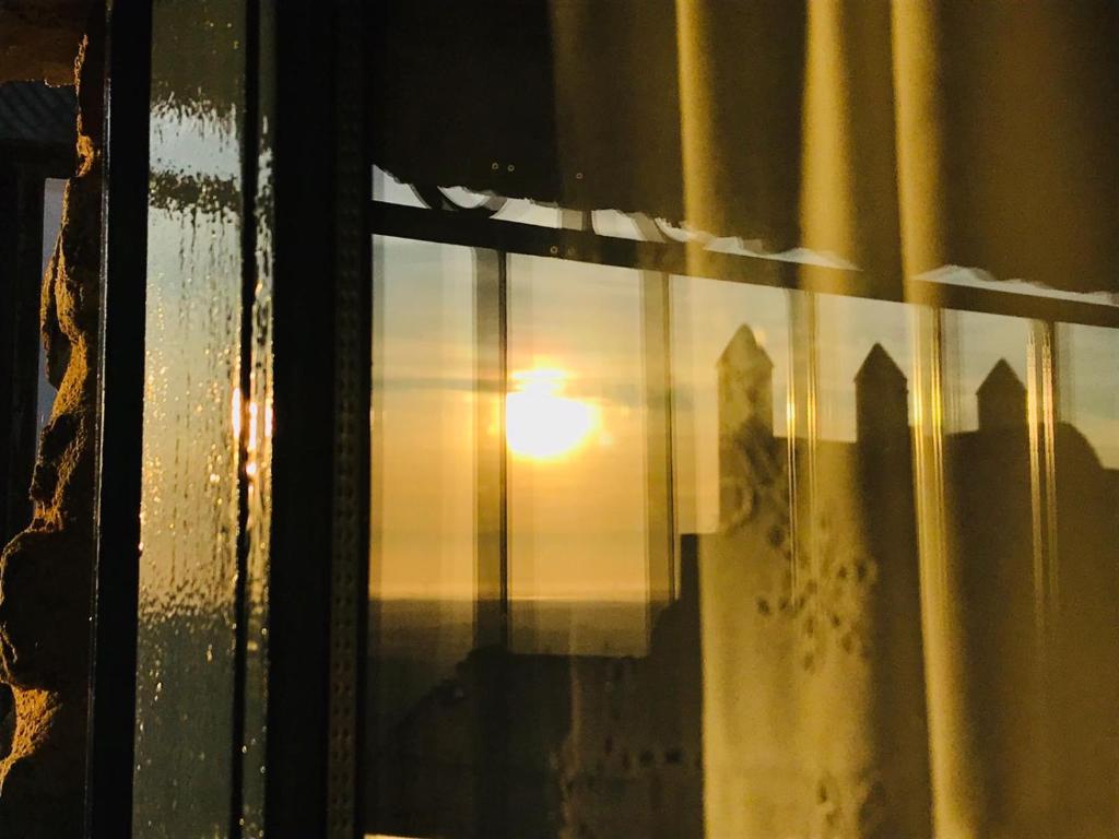 The sunrise or sunset as seen from Az apartmant or nearby