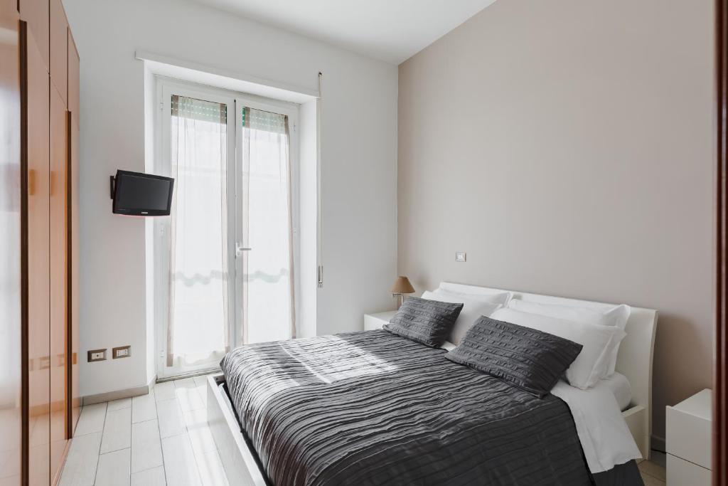 A bed or beds in a room at Casa Flo