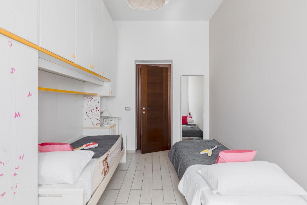 A bed or beds in a room at Casa Flo