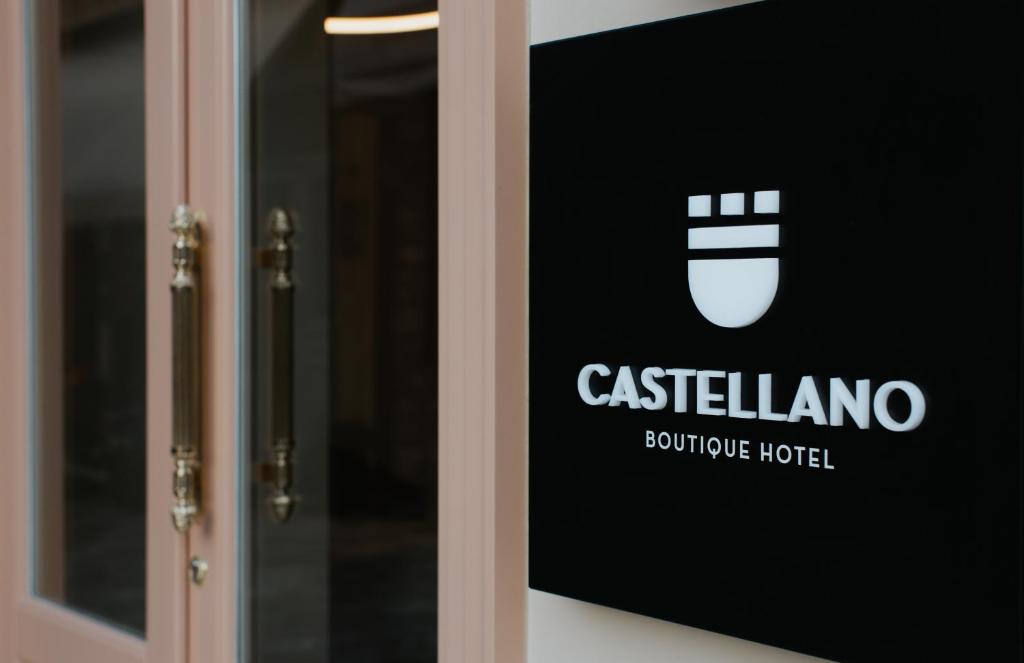 a sign on the door of a building at Castellano Hotel & Suites in Nafplio