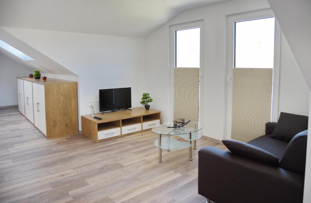 TV a/nebo společenská místnost v ubytování Boardinghouse Jungwirth-Wohnzeit