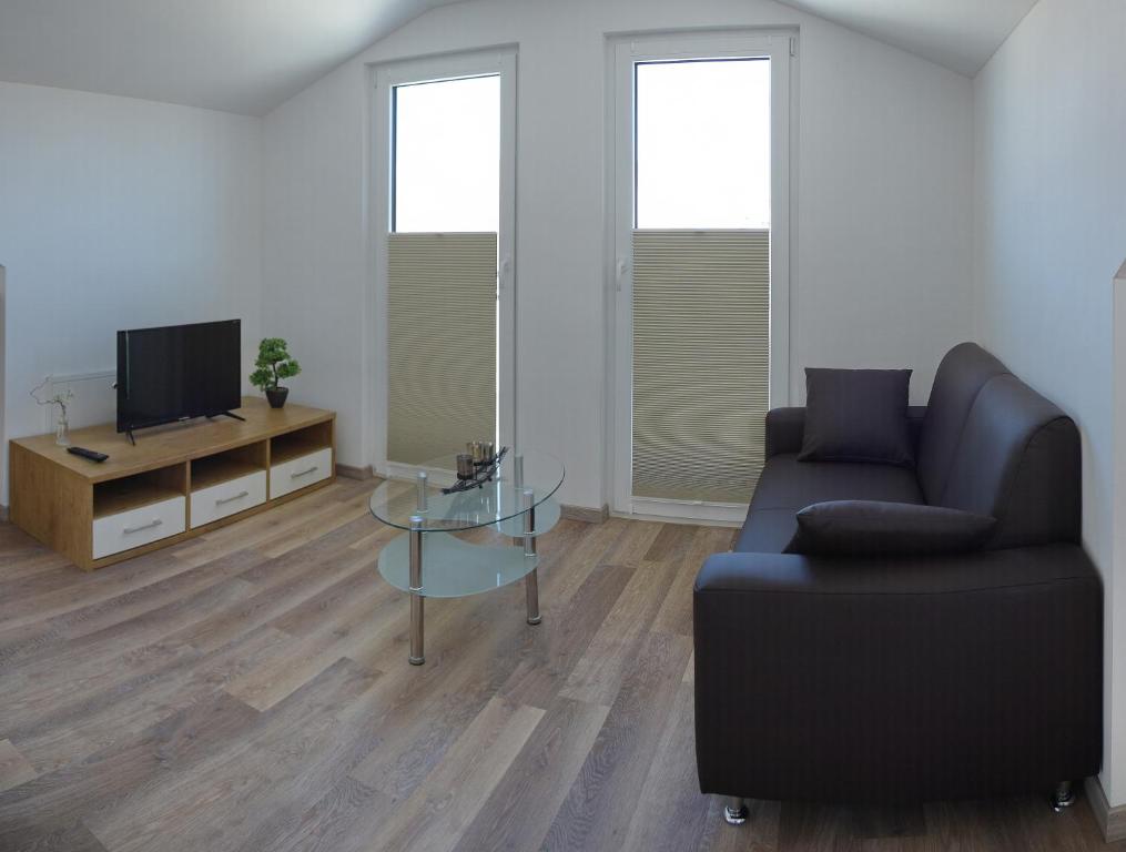 TV a/nebo společenská místnost v ubytování Boardinghouse Jungwirth-Wohnzeit