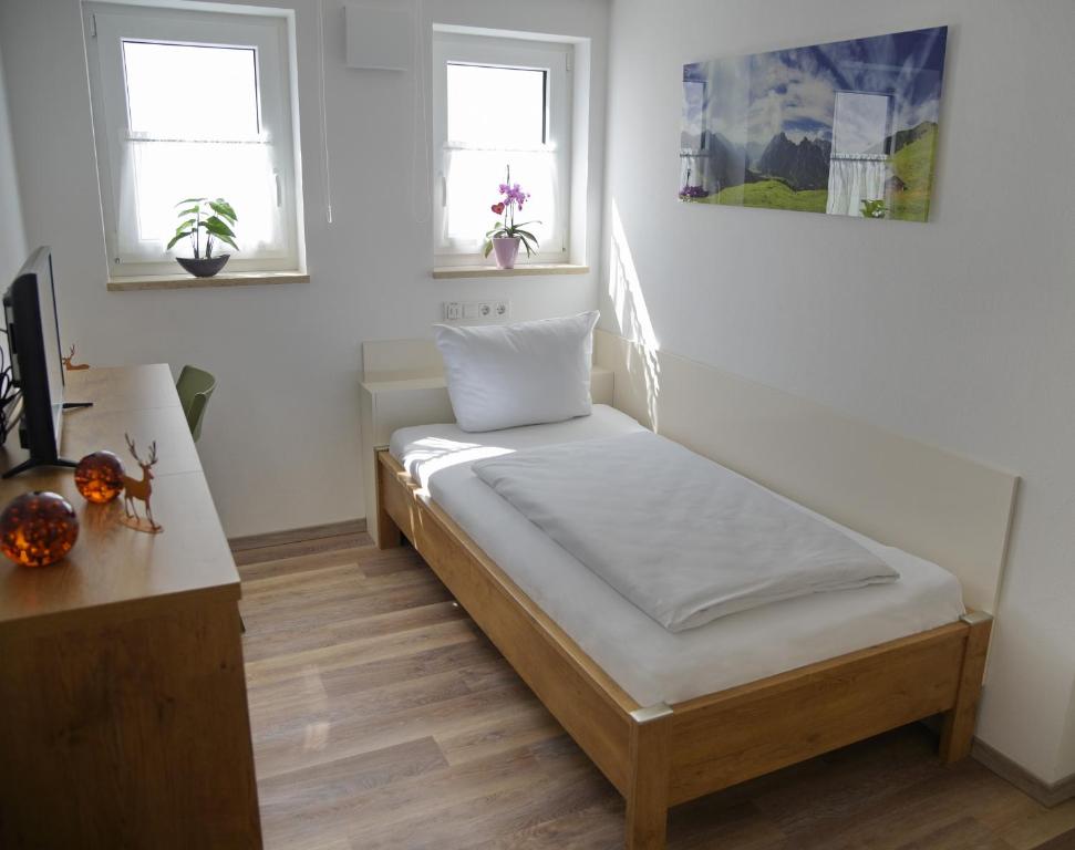 Postel nebo postele na pokoji v ubytování Boardinghouse Jungwirth-Wohnzeit