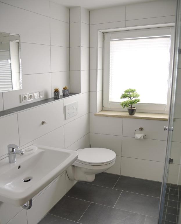 Koupelna v ubytování Boardinghouse Jungwirth-Wohnzeit