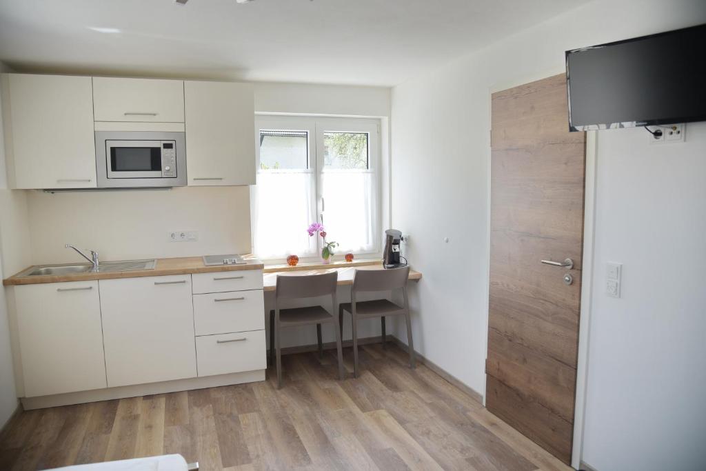 Kuchyň nebo kuchyňský kout v ubytování Boardinghouse Jungwirth-Wohnzeit