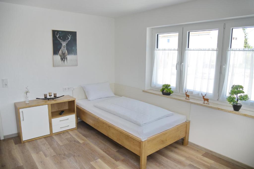 Postel nebo postele na pokoji v ubytování Boardinghouse Jungwirth-Wohnzeit