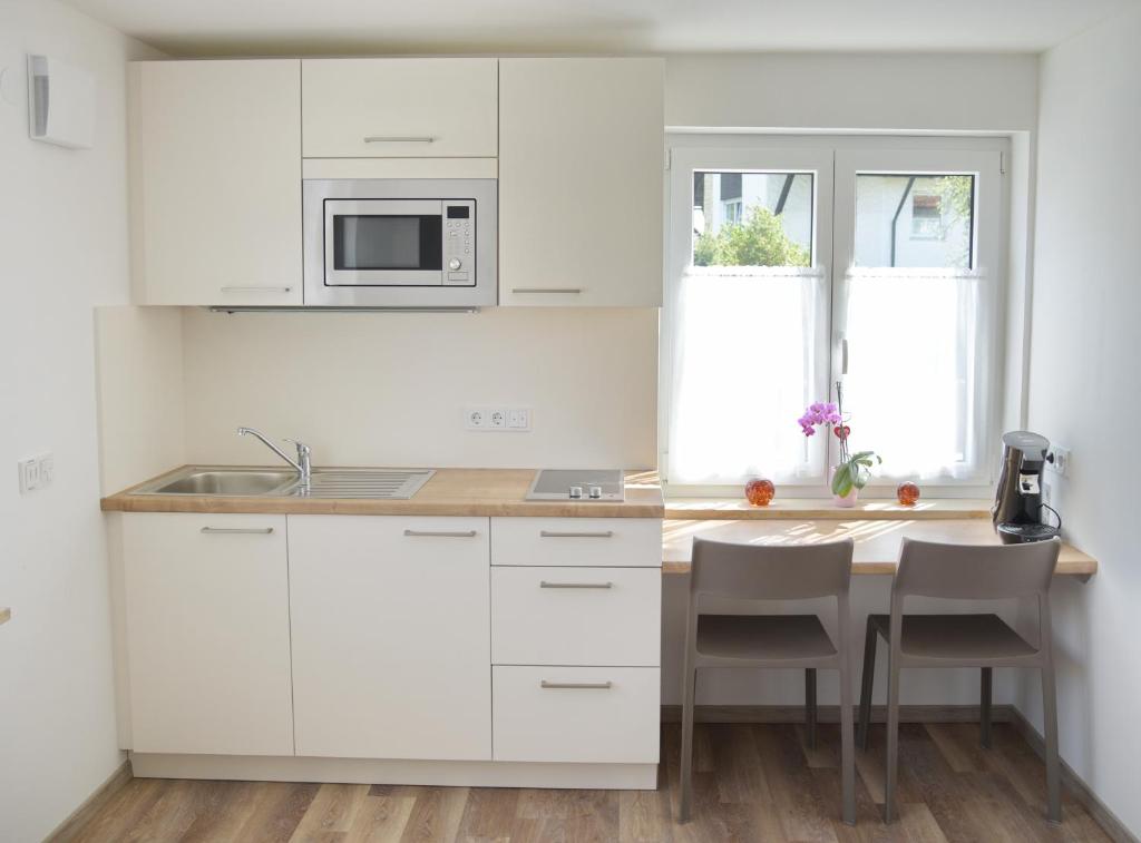 Kuchyň nebo kuchyňský kout v ubytování Boardinghouse Jungwirth-Wohnzeit