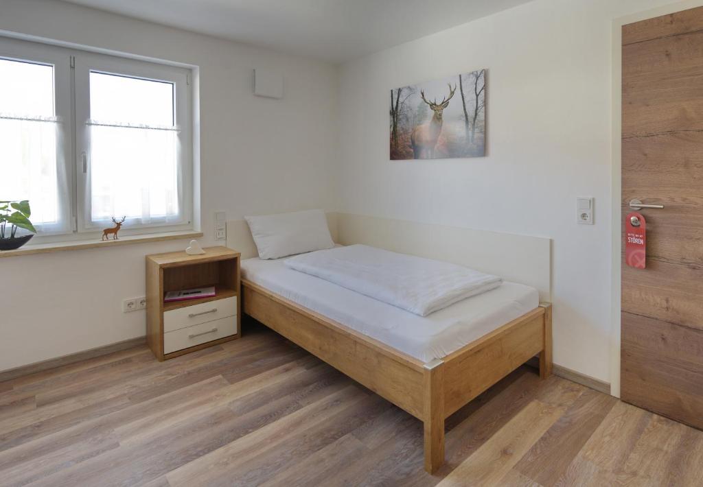 Postel nebo postele na pokoji v ubytování Boardinghouse Jungwirth-Wohnzeit