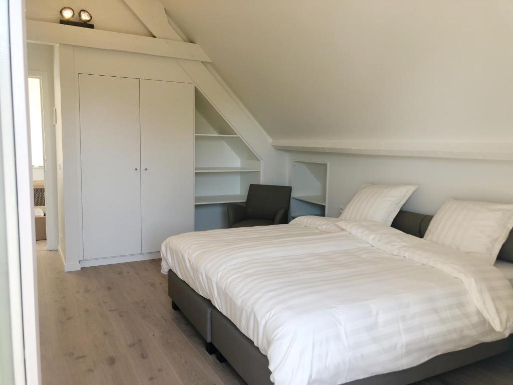 Postel nebo postele na pokoji v ubytování Villa Zuid