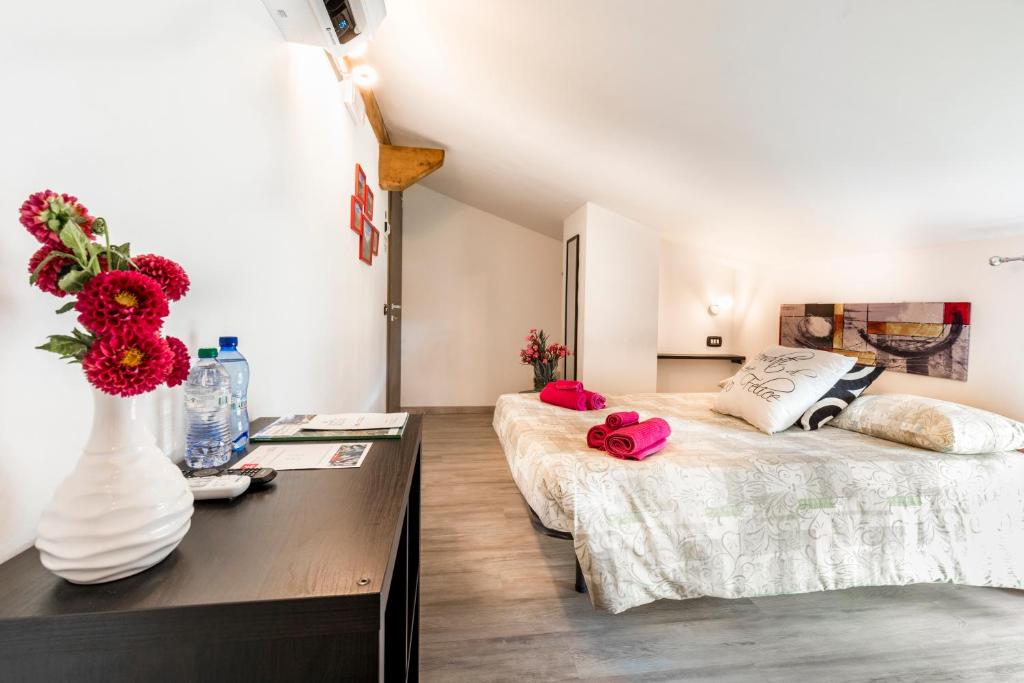 Posteľ alebo postele v izbe v ubytovaní B&B Valtellina Mon Amour