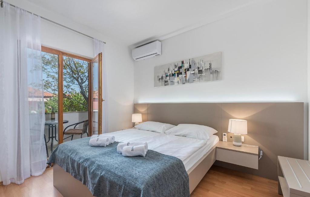 Postel nebo postele na pokoji v ubytování Villa Ladavac B&B