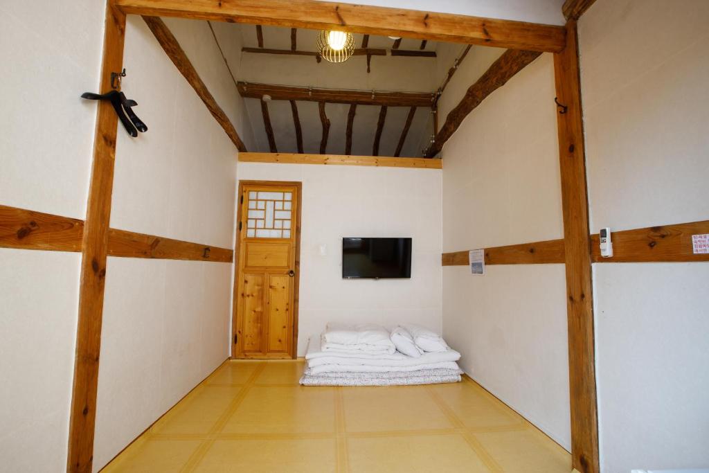 Postel nebo postele na pokoji v ubytování GaEunChae