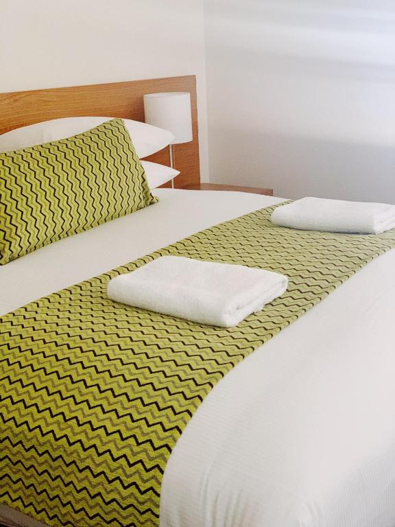 Postel nebo postele na pokoji v ubytování Red Earth Motel