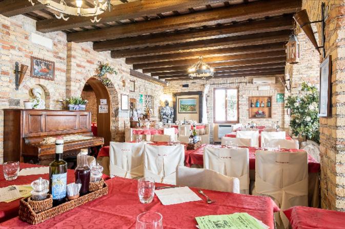 Restaurace v ubytování Principato Di Ariis